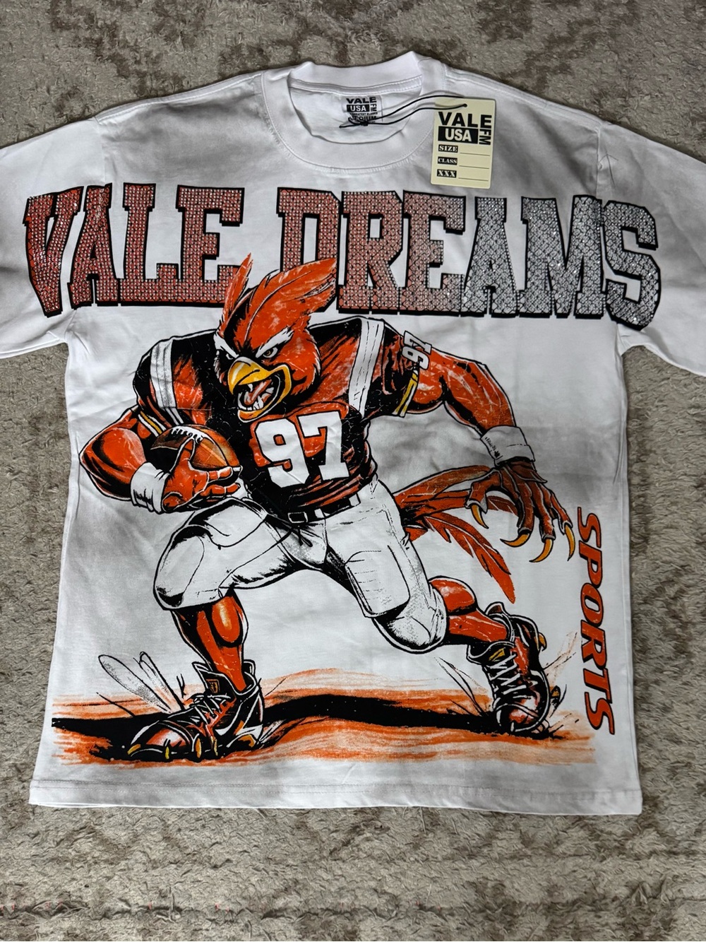 Vale Dreams Men's White Graphic Football Tee with Orange Accents